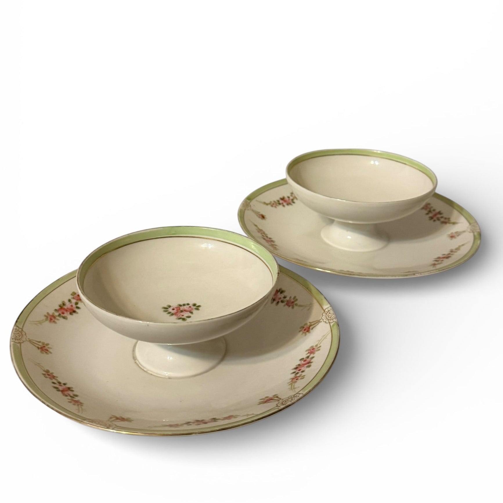 Set of ceramic bowls with floral patterns on a white background